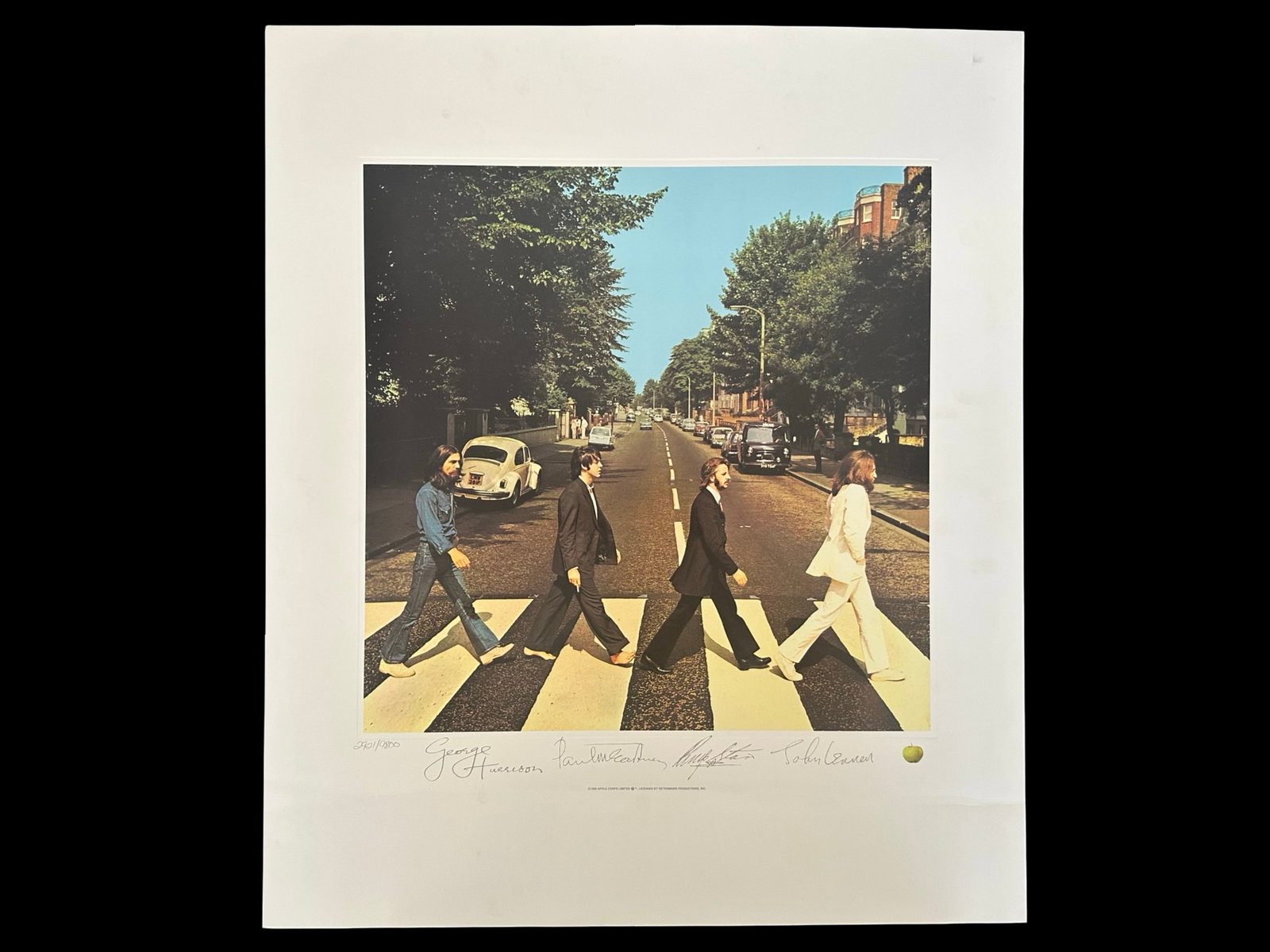 The Beatles Abbey Road Limited Edition Lithograph Print (1993) – COA #2921: Up for auction is an officially licensed The Beatles "Abbey Road" limited edition lithographic print from 1993, part of The Beatles Album Art Collection. This highly collectible piece replicates the i