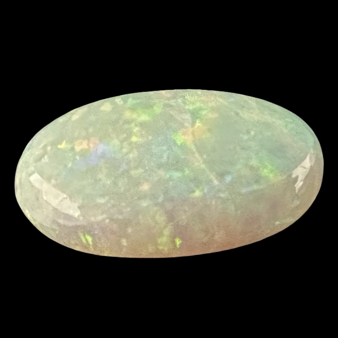 6.76 ct White Opal Oval Cabochon - Translucent Bodycolor with Red Play-of-Color, 17.02 × 12.52 ×: A sizeable 6.76 carat white opal cabochon cut in an elongated oval (approx. 17.02 × 12.52 × 4.76 mm) displaying a translucent body with attractive play-of-color that includes distinct red flashes al