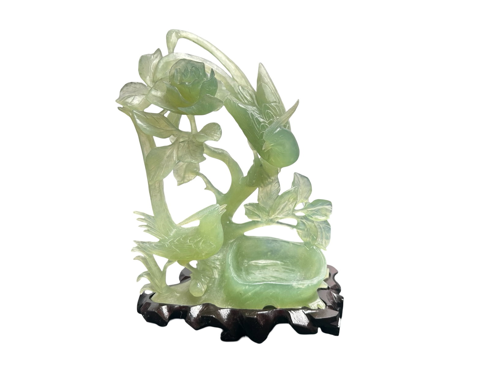 Chinese Carved Green Jade Hardstone Birds & Peony Group with Brush-Washer on Hardwood Stand,: Impeccably hand-carved from a single translucent apple-green hardstone traditionally sold as “jade,” this elegant Chinese figural group presents two songbirds in lively relief among scrolling 