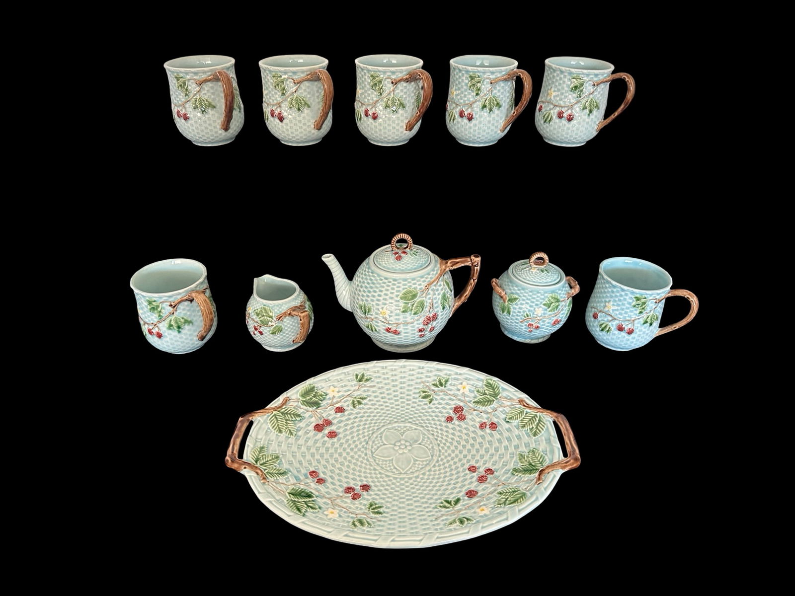 Tiffany & Co. Portuguese Majolica “Strawberry Basketweave" 11-Piece Tea Service with Large: This rare and elegant Tiffany & Co. 11-piece tea service showcases the highly collectible Portuguese Majolica “Strawberry Basketweave” pattern, a design that combines artistry and refinement.