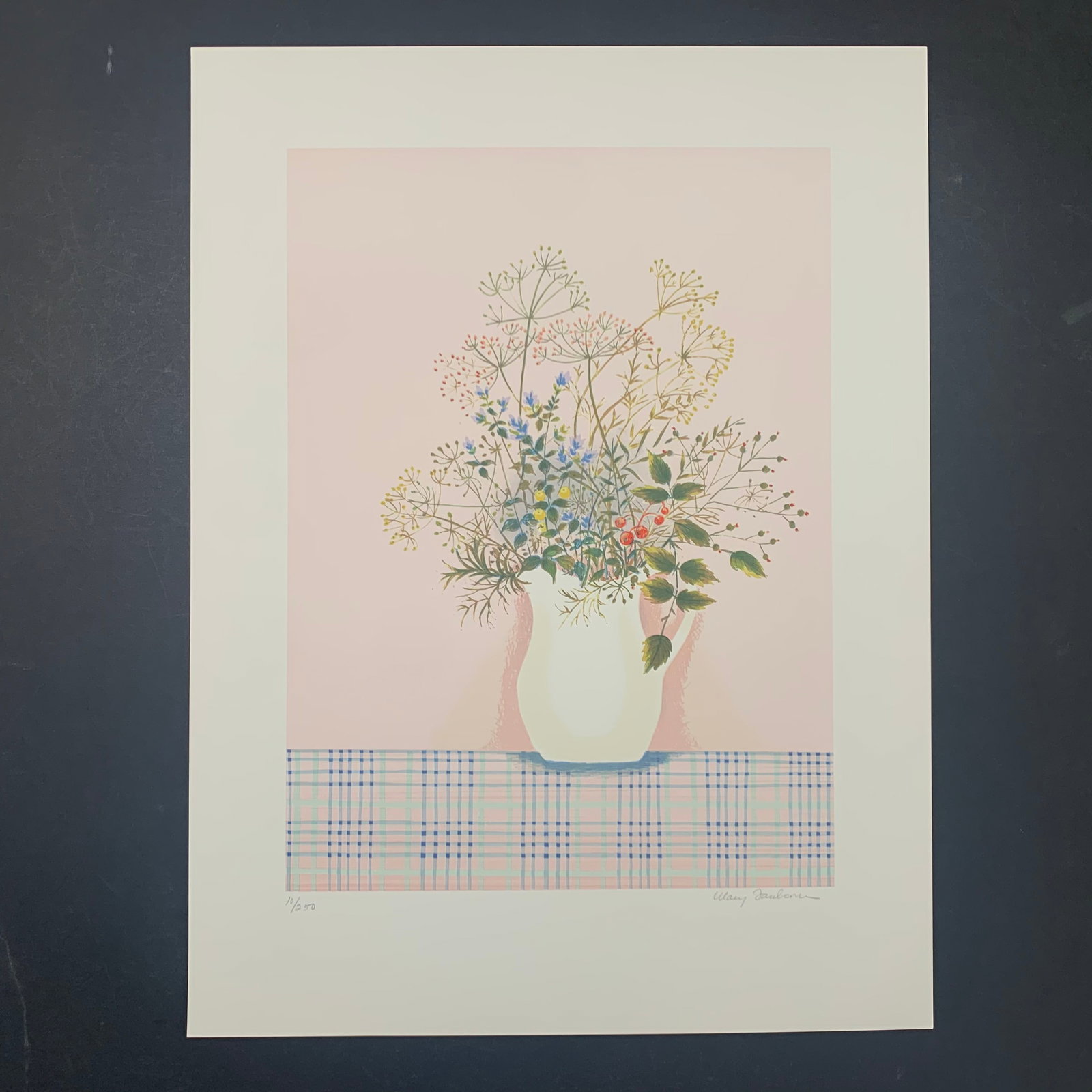 Mary Faulconer's "Herbs On Pink Background" Limited Edition Print: Mary Faulconer's "Herbs on Pink Background" limited edition print, signed lower right, and numbered 10/250 lower left. These piece is of a few colourful herbs in a white vase with a handle. This piece