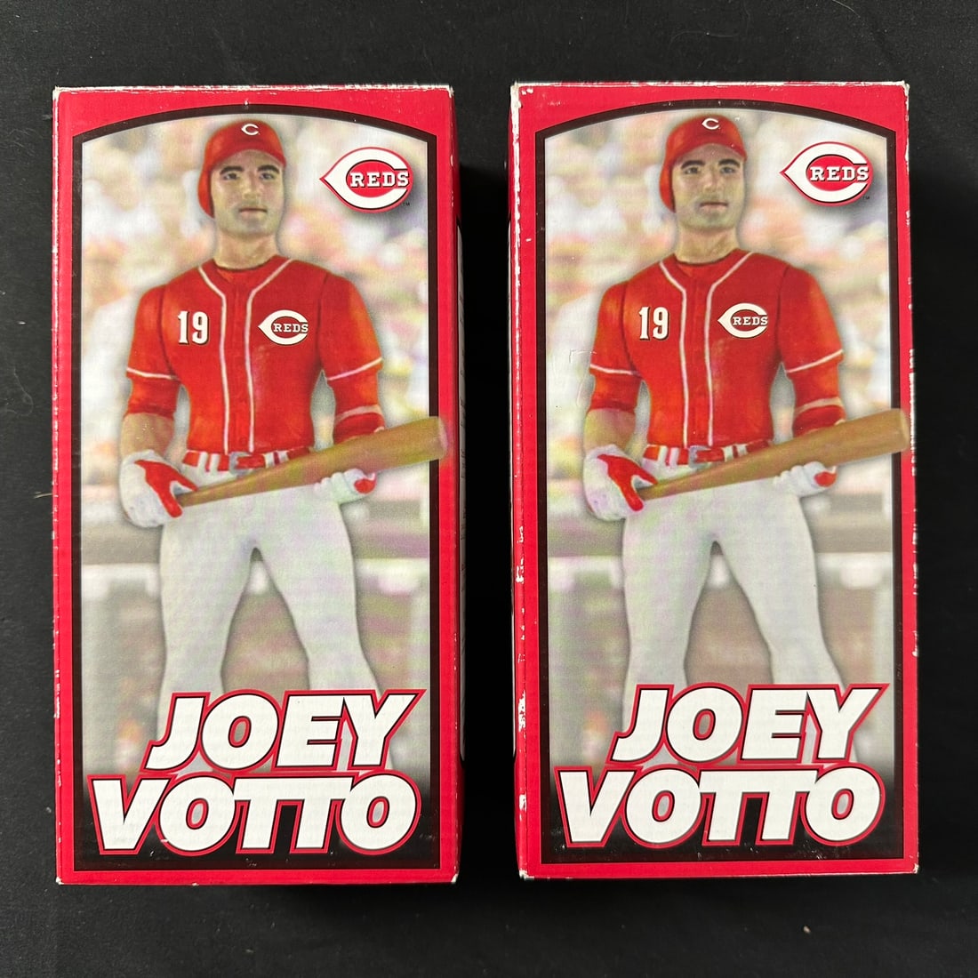 Joey Votto Cincinnati Reds Champion Figurines: A pair of Champion Joey Votto figurines when he played for the Cincinnati Reds, in their original boxes. Boxes show extremely minor signs of wear. Sports Memorabilia, Collectibles, Baseball, MLB Box (
