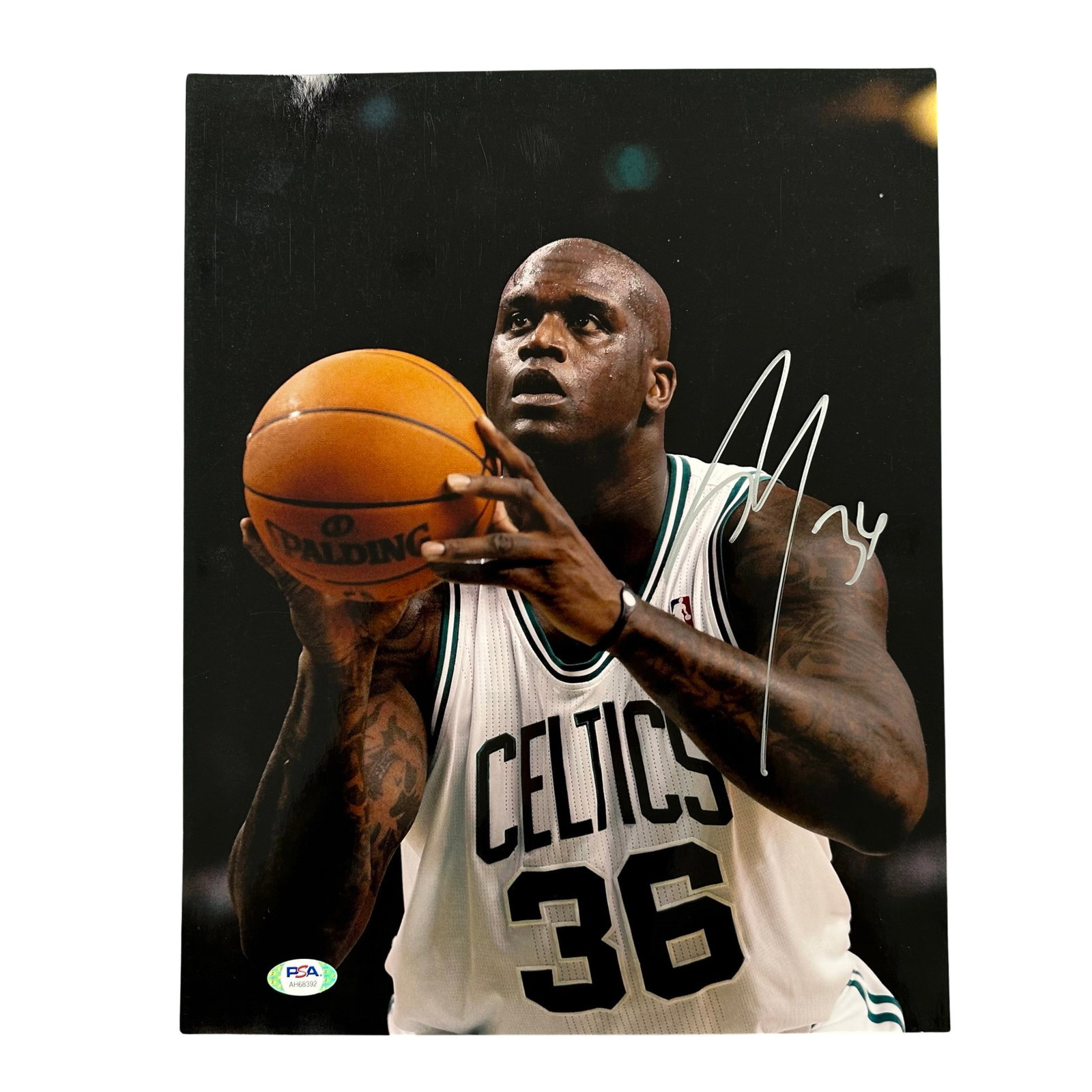 Shaquille O'Neal Boston Celtics Signed Photo: An autographed photograph of Shaquille O'Neal playing for the Boston Celtics, about to a make a free throw during a game. Included with a PSA COA. Sports Memorabilia, Autographs, Signatures, Collectib