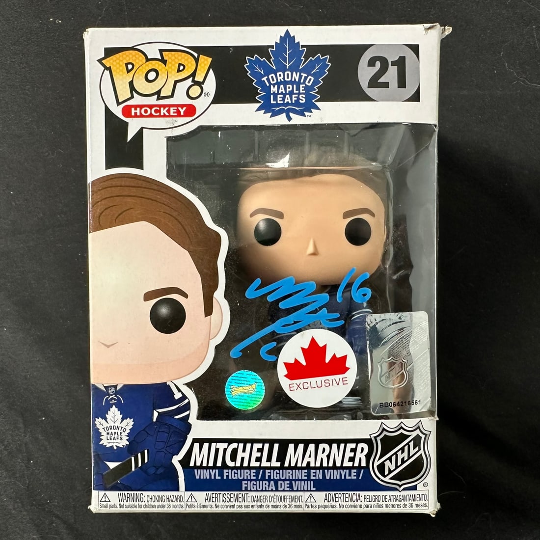 Funko Pop Figurine Mitch Marner #21 Signed: An autographed Toronto Maple Leafs Mitch Marner Funko Pop figurine #21, brand new in box. Box does have some very light tape adhesion remnants on the back, and very small damage to one top corner. Inc