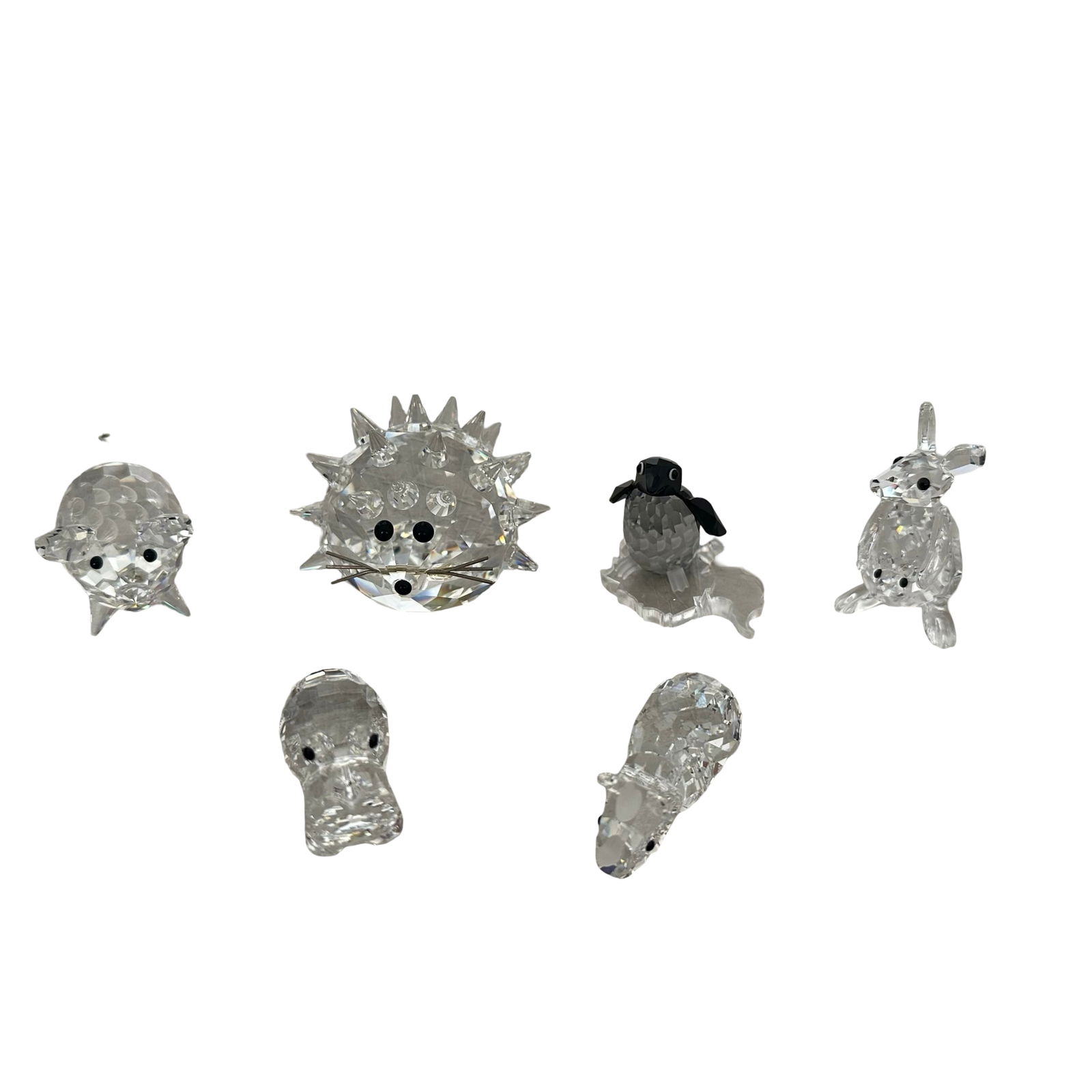 Swarovski Crystal Animal Figurine Collection - Set of 6 with Original Boxes - Retired Pieces: Explore this charming set of six retired Swarovski crystal animal figurines, each masterfully crafted in precision-cut clear and colored crystal. Featuring adorable depictions of a penguin, hedgehog,