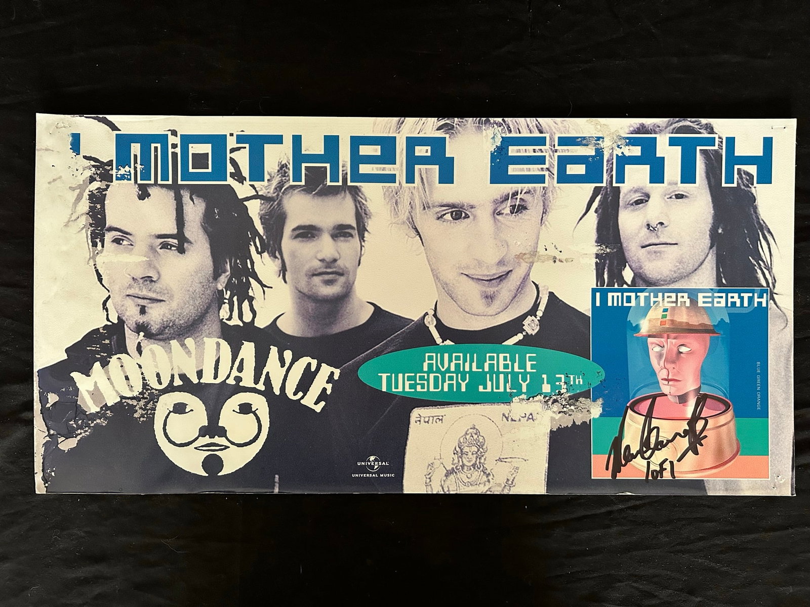 I Mother Earth Publicity Poster: I Mother Earth out of print Moondance cardboard publicity poster, signed 1 of 1. This piece shows some surface damage in places, with some very minor moisture damage at left edge. Image: 12" x 24".