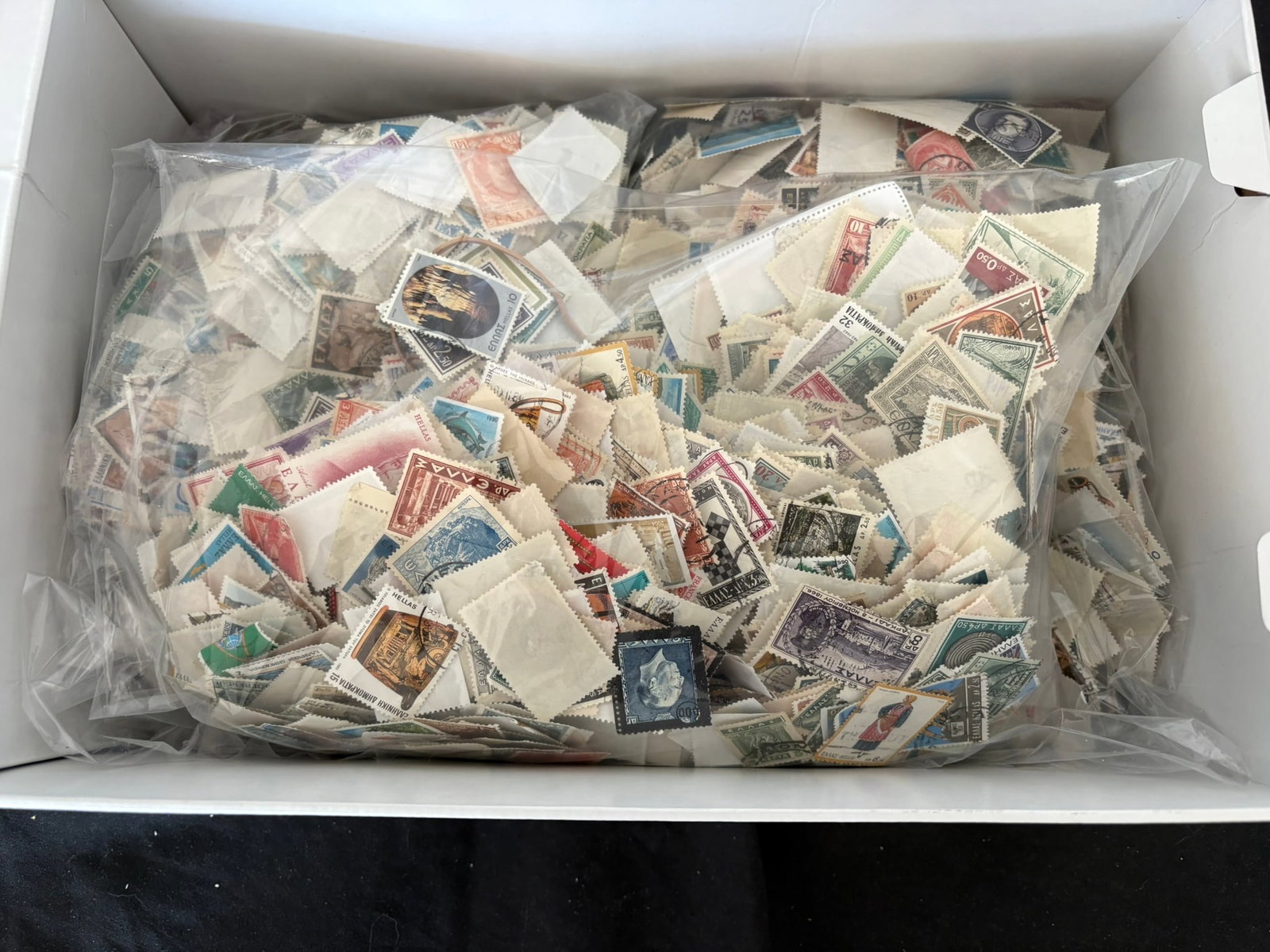 Greece 1950s to 1980s, a large duplicated accumulation of stamps all off-paper contained in shoe (1 of 5)