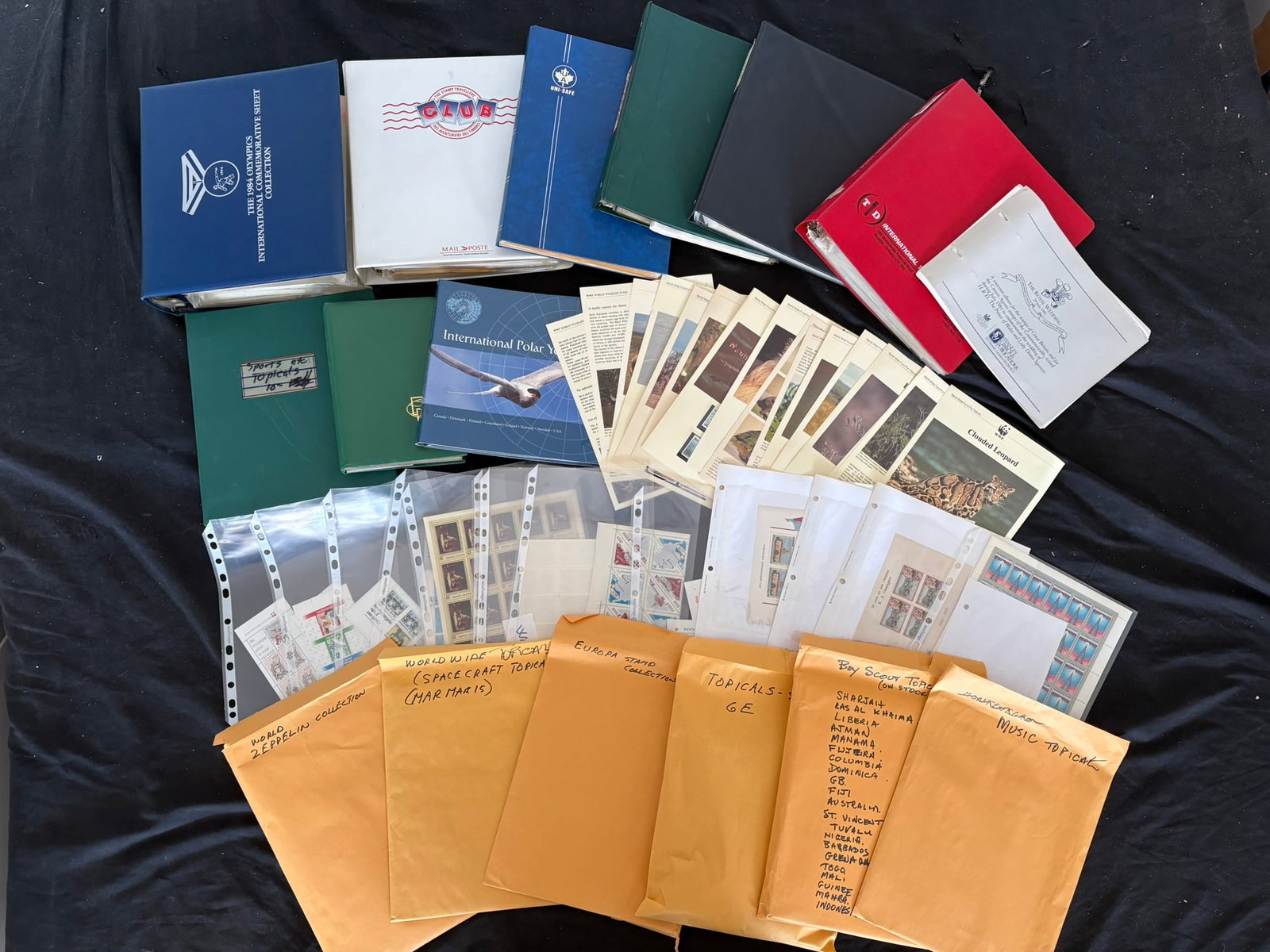 Topicial collection 1960s to 1990s, a MNH /MH and used nine albums and loose packets, includes (1 of 4)