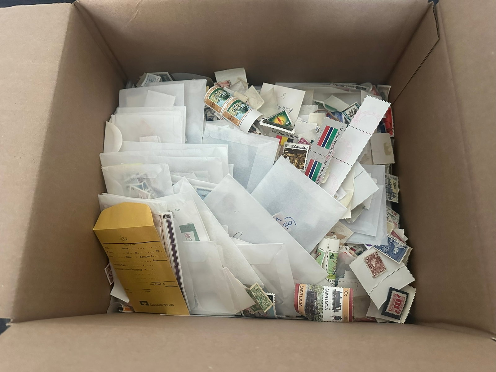 A worldwide MNH / MH and used accumulation 1960s to 1990s in glassines packets, 102 cards, and (1 of 9)