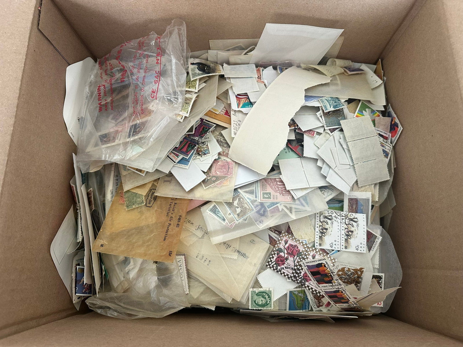A worldwide MNH / MH and used accumulation 1960s to 1990s in glassines packets, 102 cards, and (1 of 6)