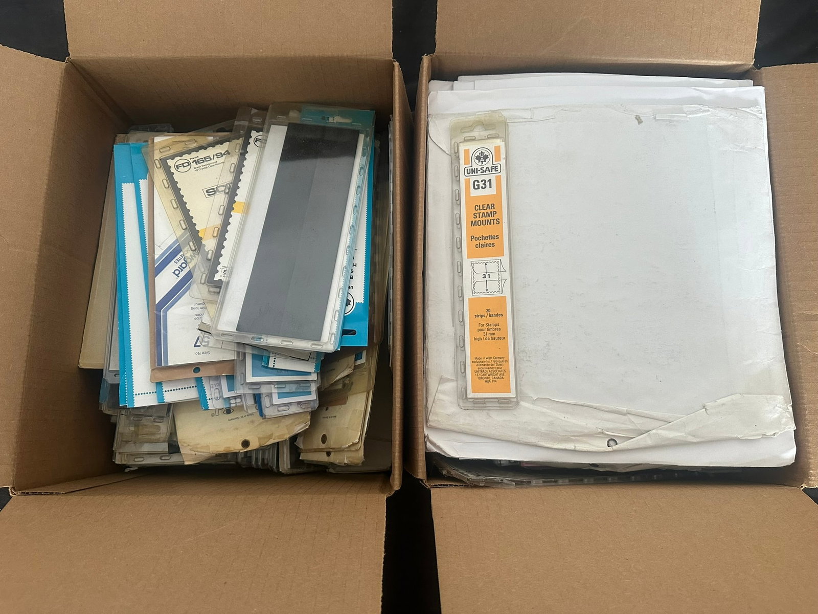 Supplies - two Cartons containing clear and black mounts in various sized strips, outer packaging (1 of 9)