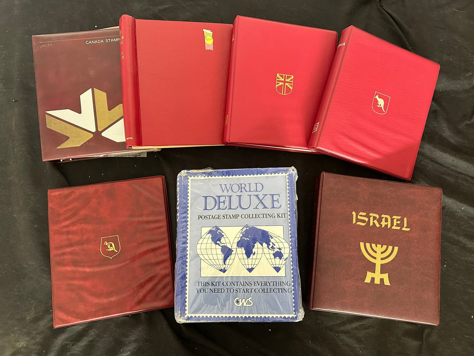 Supplies- a carton containing 5 unused albums, includes Minkus album Israel 1948-1992, Stanley (1 of 3)