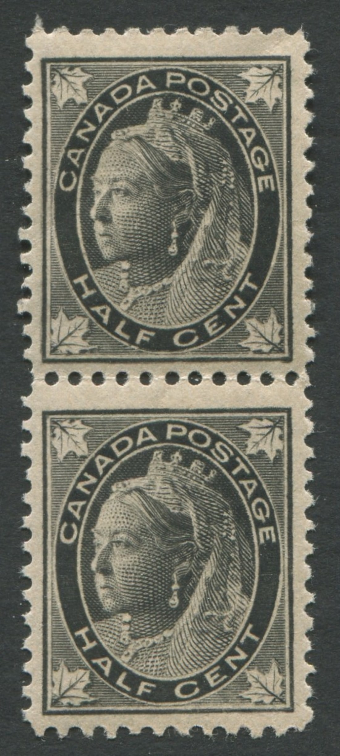 Canada 1897 - 1898, #66 and #66i, 1/2c black vertical pair with re-entry on upper, Unitrade value (1 of 2)