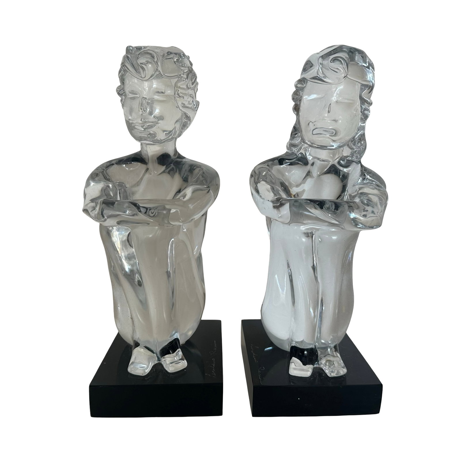 Monumental Lorenzo Rozano Signed Crystal Figural Bookends - Matched Male and Female Sculptures on: An exceptional and visually commanding pair of monumental crystal figural bookends by Lorenzo Rozano, executed as a matched male and female sculptural ensemble. Each figure is carved or cast from subs