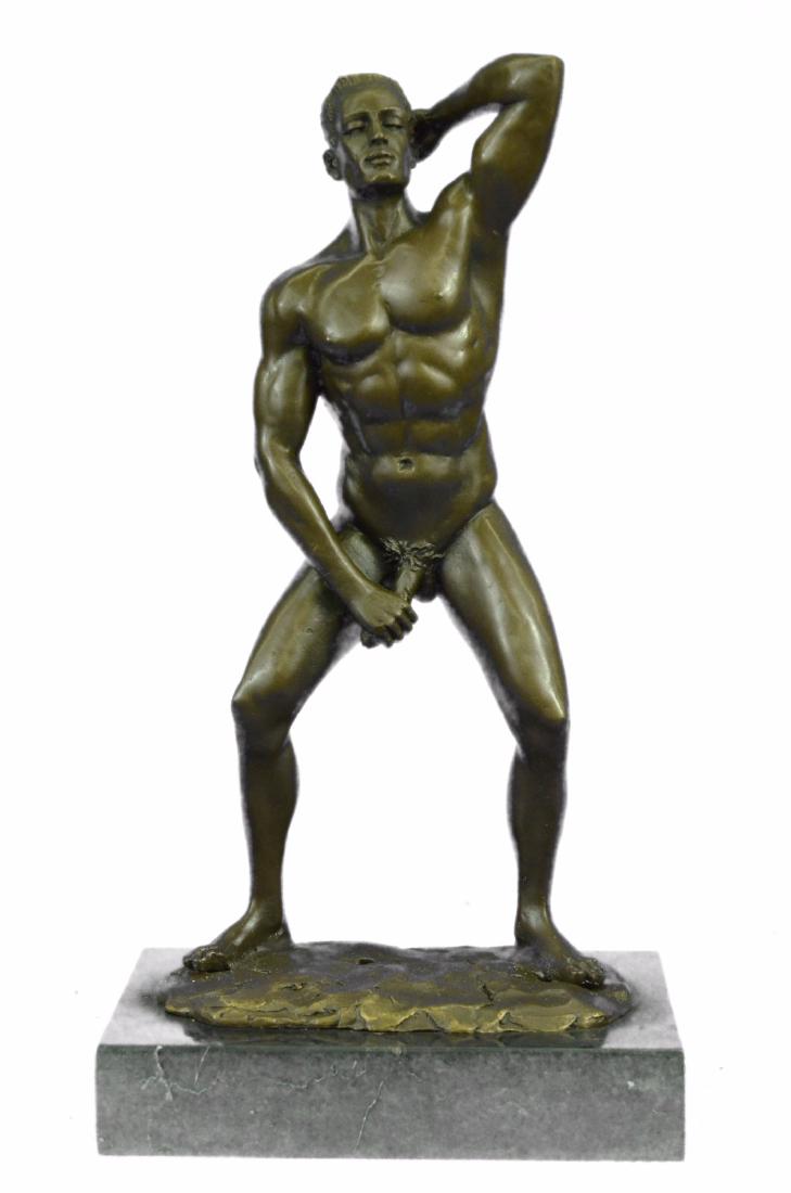 Nude Gay Man Bronze Sculpture on Marble Base Statue: He boldly stands in the buff with a look of fearless determination. This proud gay man exposes his manly erection, proving he knows no shame. Just one example of his gorgeous body. He is lean and musc