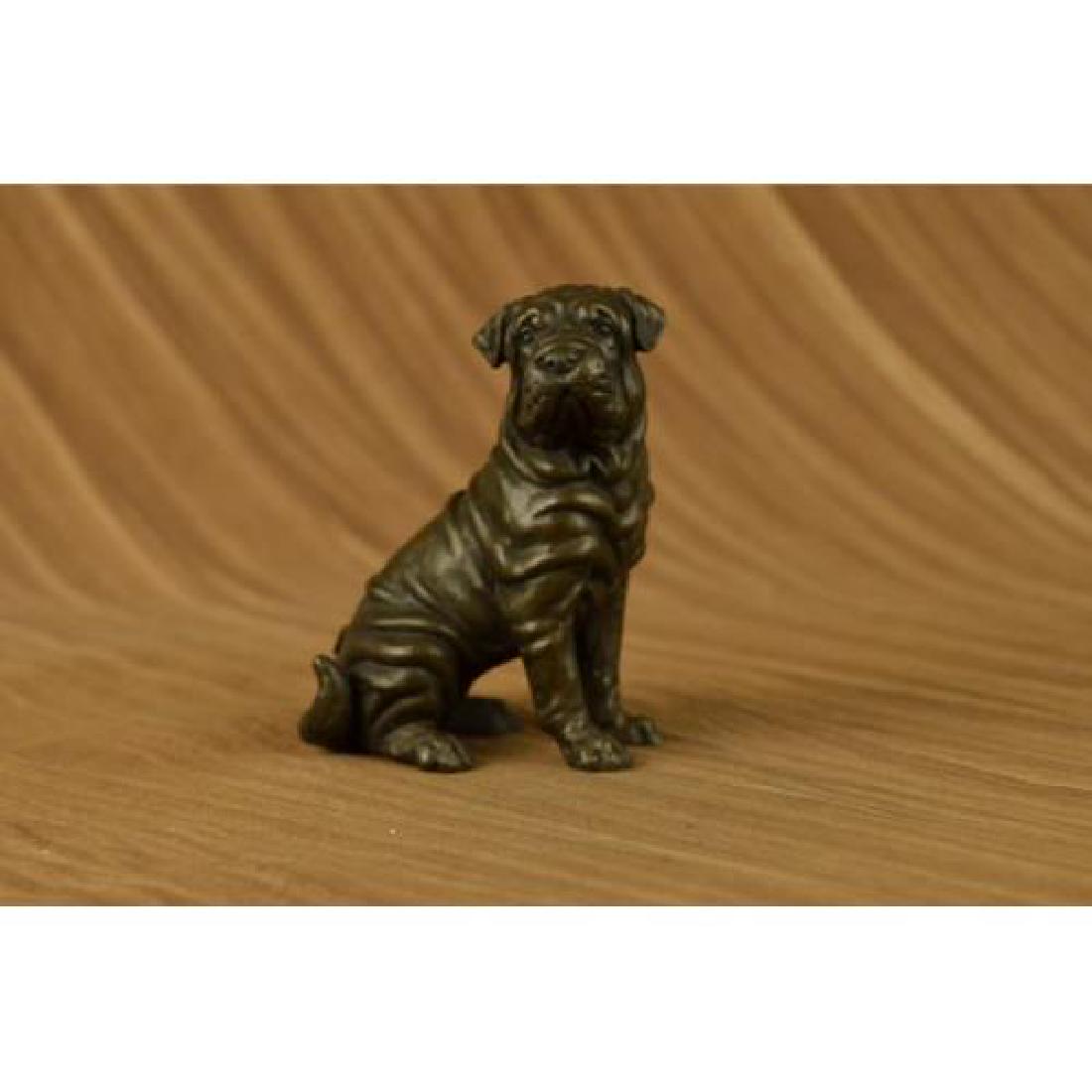 English Bull Dog Bronze Sculpture: This cute English Bull Dog Bronze Sculpture looks up with the sweetest look and taking a brake from a long day. This little English Bull Dog is the perfect touch of decor for a sweet and loving home.