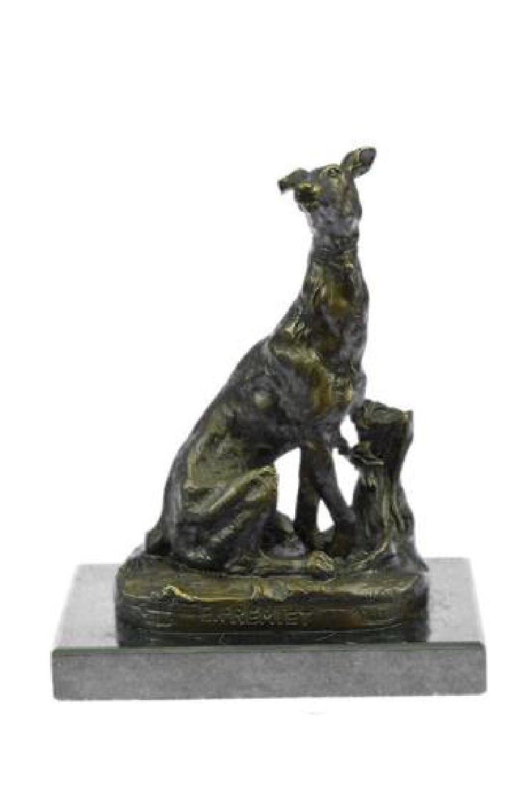 Greyhound Dog Bronze Sculpture: The powerful pose captured in this sophisticated piece creates a unique, simple elegance that is hard to find. This dog statue has been carefully sculpted, every muscle and detail of the face and body