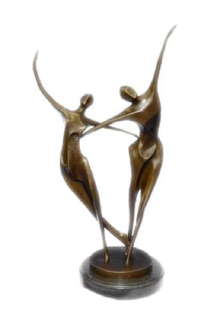 Shall We Dance Bronze Sculpture: This Bronze Sculpture is to be supremely elegant and graceful. Art Deco is a geometry of clean, crisp lines drawn in broad, sweeping gestures. This Sculpture was cast using the Lost Wax Method and has