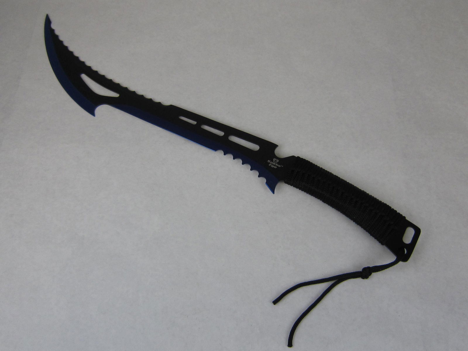 Snake Eye Tactical Zombie Killer Machete Two Tone Blue: Constructed from a solid slab of heavy duty stainless steel, this full tang machete is a fearsome weapon. A versatile two tone blue and black blade, sawbuck serrations on both sides allow this blade t