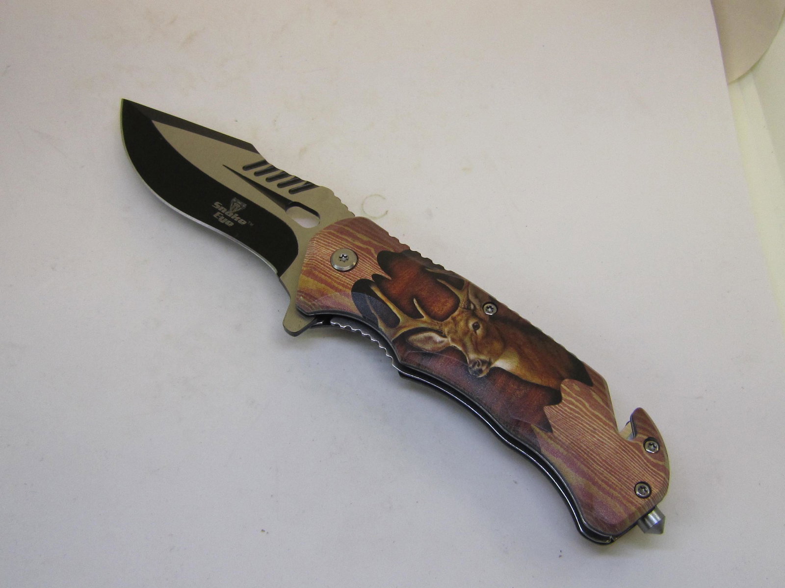 Snake Eye Tactical Spring Assist Knife: Snake Eye Tactical Spring Assist Knife 4.5 inches Closed. Stainless Steel Black blade. Pocket Clip 4.5 inches Closed. 3.25 inches Blade. Weight: 5 LBS.