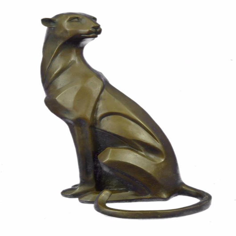 Mountain Lion Bronze Sculpture: Though the most feared and lethal predator of the jungle, the beauty of a lion is undeniable. This handmade and fully detailed Sculpture includes the smallest details of the king of all wild cats, inc
