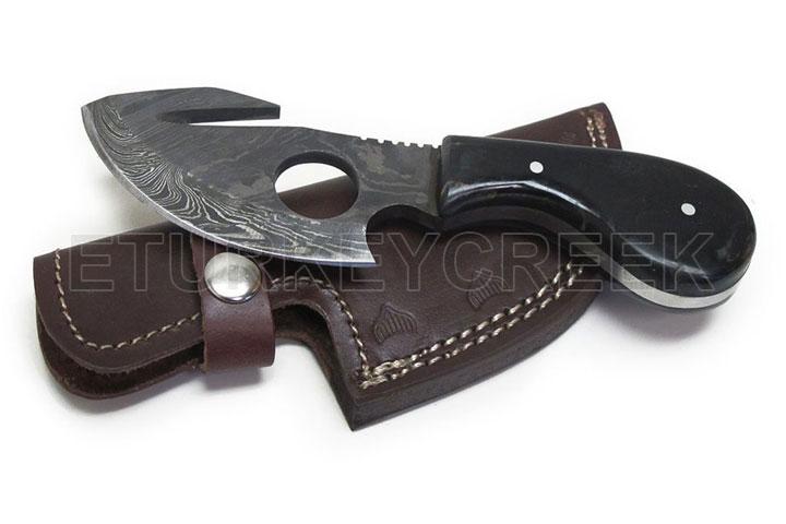 Wild Turkey Handmade Damascus Buffalo Horn Full Tang: Wild Turkey Handmade Damascus Black Color Handle, Buffalo Horn Full Tang Cat Skinner w/ Gut Hook Fixed Blade Hunting Knife. 7" Overall. Includes Leather Sheath.