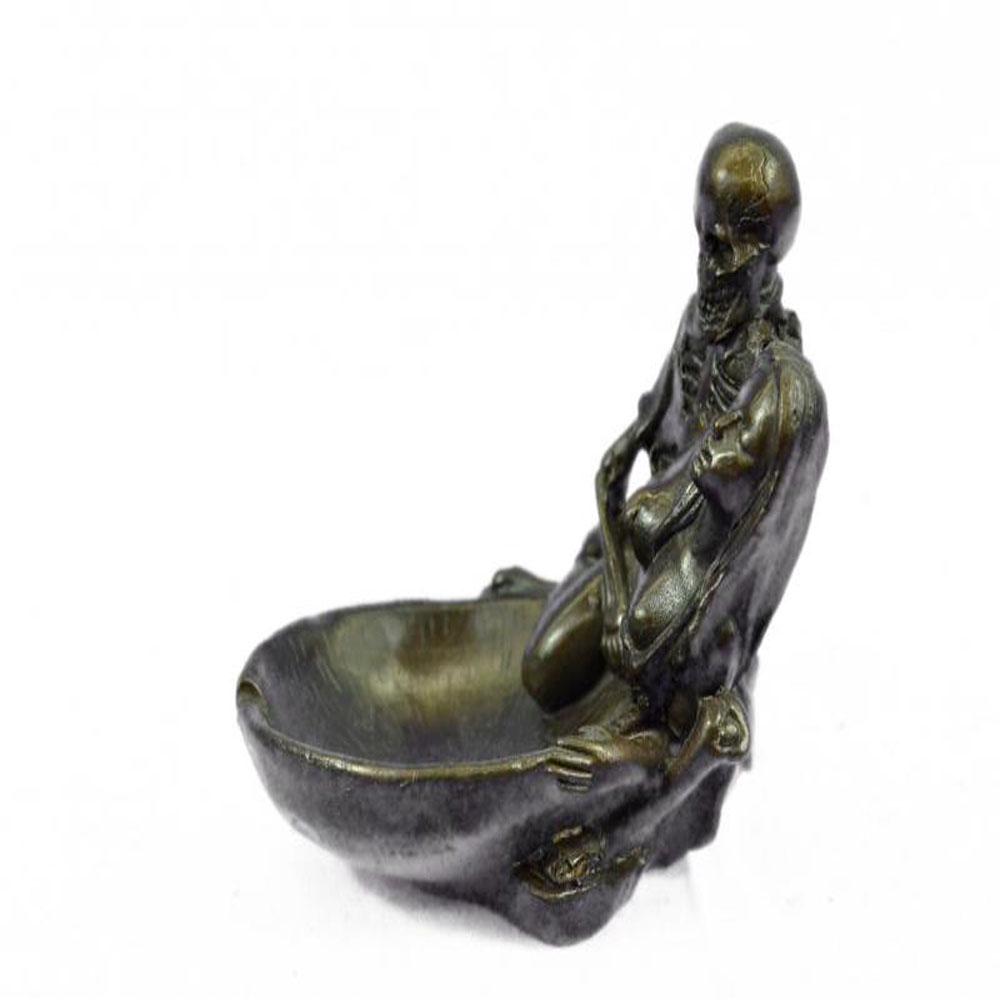 Key Holder Skeleton With Nude Girl Ashtray Bronze: A hard to find collectible Hand crafted ashtray. This pinup girl beauty will made a great addition to any ashtray collection. This Bronze Sculpture was casted using the Lost Wax Method and has a two t