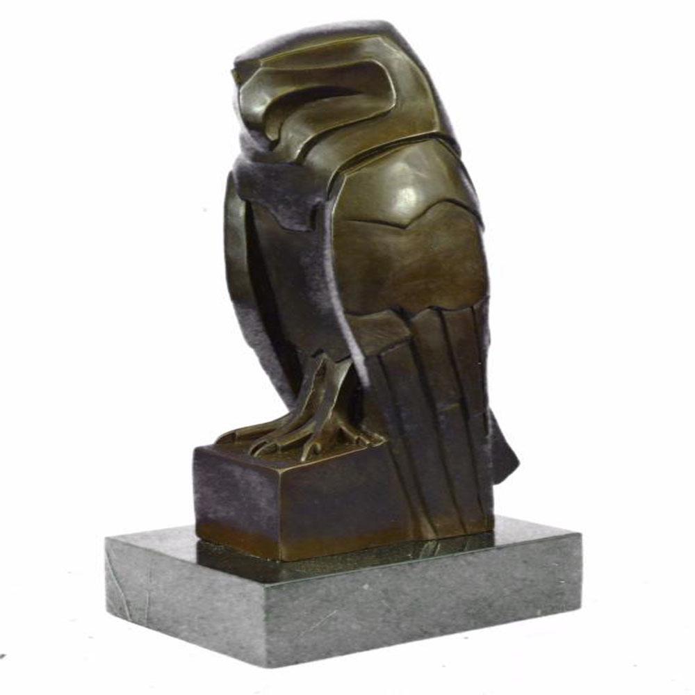 Abstract Modern Art Owl Bronze Sculpture on Marble Base: A quaint owl rests upon his perch, looking out into the night sky. His innate ability to listen keeps him occupied as he listens to the sounds of the night, waiting to hear the scurry of a mouse so th