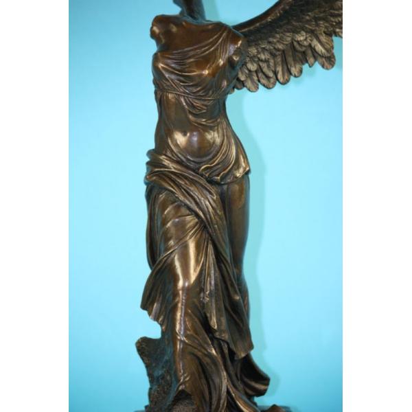 Goddess Nike-Winged Bronze Statue: This is an impressive replica cast in Bronze of the famous Winged Nike of Samothrace, one of the most important and beautiful surviving masterpieces of antiquity. The marble statue of the Winged Nike 