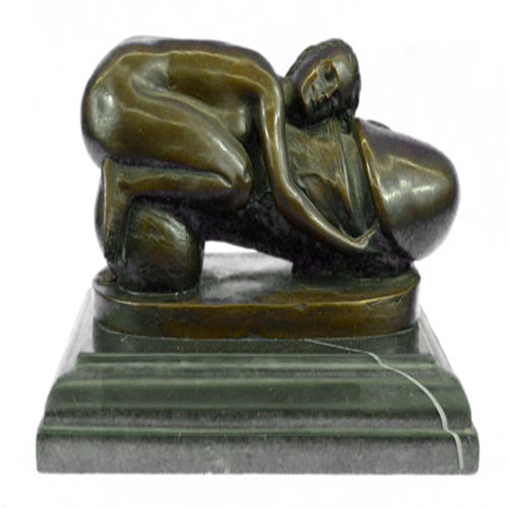Nude Girl Flying Penis Bronze Sculpture: Bronze nude petting a goat. This exquisite sculpture depicts a naked woman petting a goat head. This attractive piece would enhance a garden or a patio. It would make a beautiful gift for anyone who l