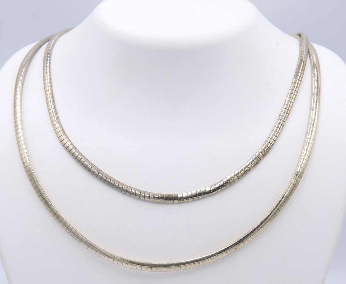 Lot of 2 Vintage Italian 925 Sterling Silver Omega Necklaces: Lot of 2 Vintage Italian 925 Sterling Silver Omega 16 and 18 inches Necklaces. Total weight of Lot 40.2 Grams.