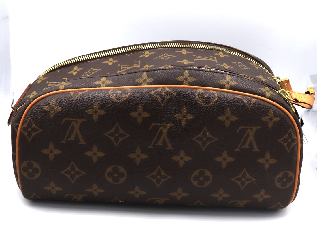 Louis Vuitton Monogram Dopp Kit Toilette Pouch bag: Louis Vuitton Monogram Dopp Kit Toilette Pouch bag. Made in Paris. 10 inches Long..