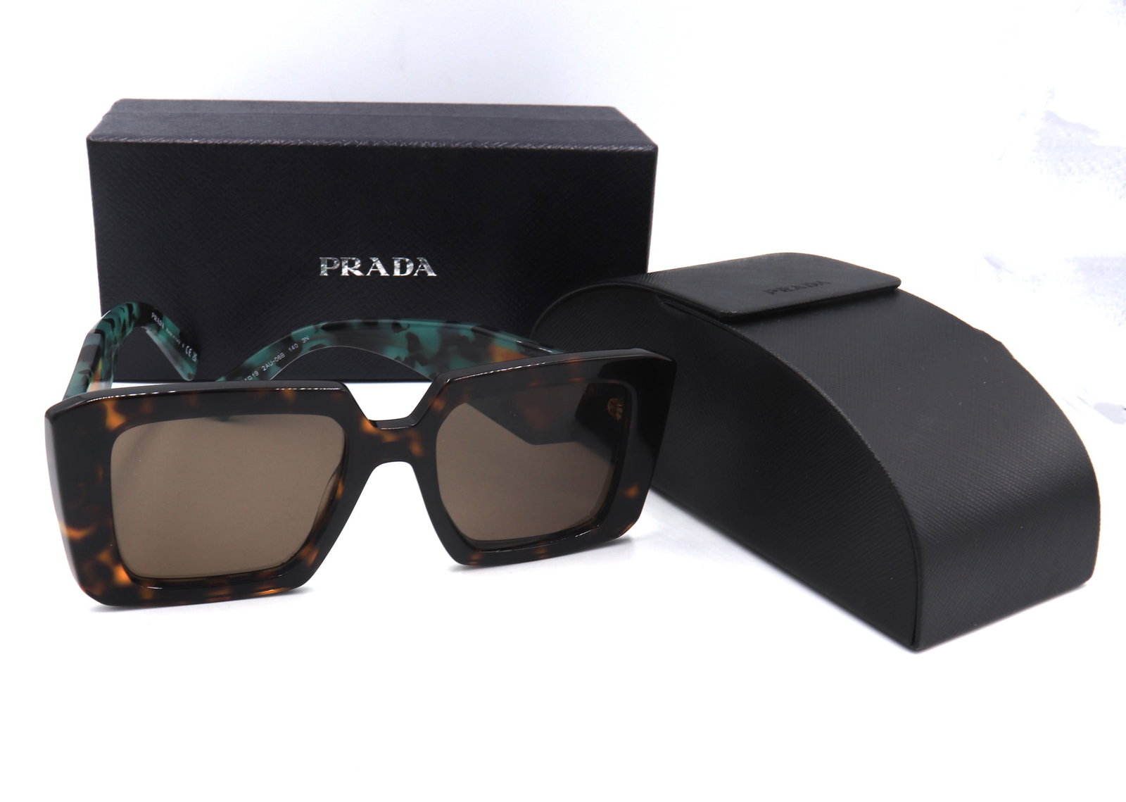 Prado SPR23Y square sunglasses: Prado SPR23Y square sunglasses with Inter and outer box. Made in Italy.