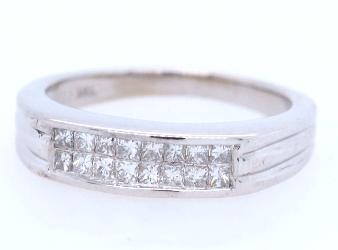 14kt WG Double Row Invisible Set Diamond Ring: This Glowing 14kt White Gold Ring features approx. 0.25CTW of Round Diamonds set in an Invisible Set Double Row Band. This band weighs approx. 4.70 Grams. Size 7"