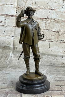 Bronze Sculpture of a Spanish Conquistador on Marble Base Lost Wax Method Figure: This classic reproduction artwork of a French cavalry officer was sculpted by Thom Anatole Guillot(French, 1865-11911). It depicts the officer in elaborate military garb, holding up his cup in a