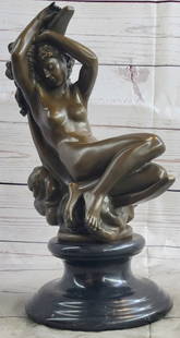 DENECHEAU DIANA RECLINING ON A MOON BRONZE SCULPTURE ON MARBLE BASE FIGURINE ART: Signed S.Denechau . Bronze, dark brown patinations, on a black marbel base. Seraphin Denechau studied under Rude and David D'Angers, and exhibited at the Salon from 1859. His official commissions