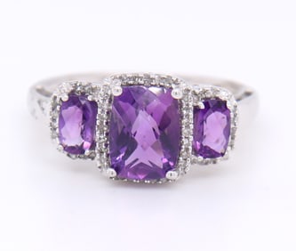 Charming White Gold Three Stone Amethyst and Diamond Halo Ring