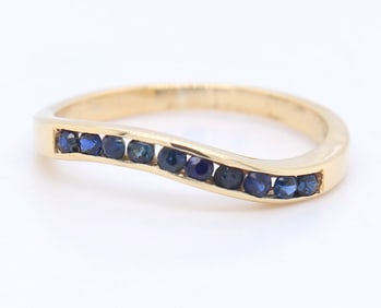 14kt Yellow gold blue sapphire curved band