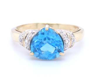 9kt Yellow gold 3ct Trillion swiss blue topaz and diamond accent ring