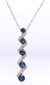 14kt White gold blue sapphire and diamond twisted bar pendant on chain necklace