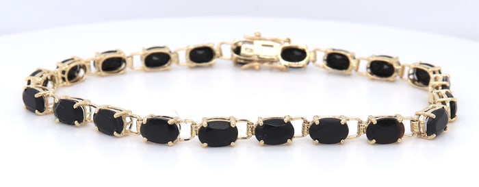 10kt Yellow gold oval black onyx tennis bracelet