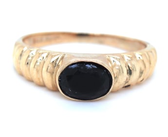14kt Yellow gold black onyx bezel set twisted ring