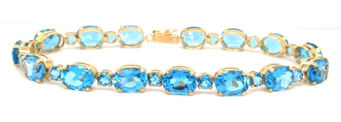 14kt Yellow gold oval blue topaz link bracelet