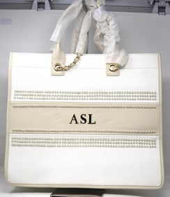 Abbott Lyon white and beige Pearl canvas resort bag