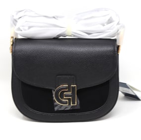 Brand new Cole Haan black leather saddle bag