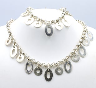 Set of 925 sterling silver charm necklace and matching bracelet