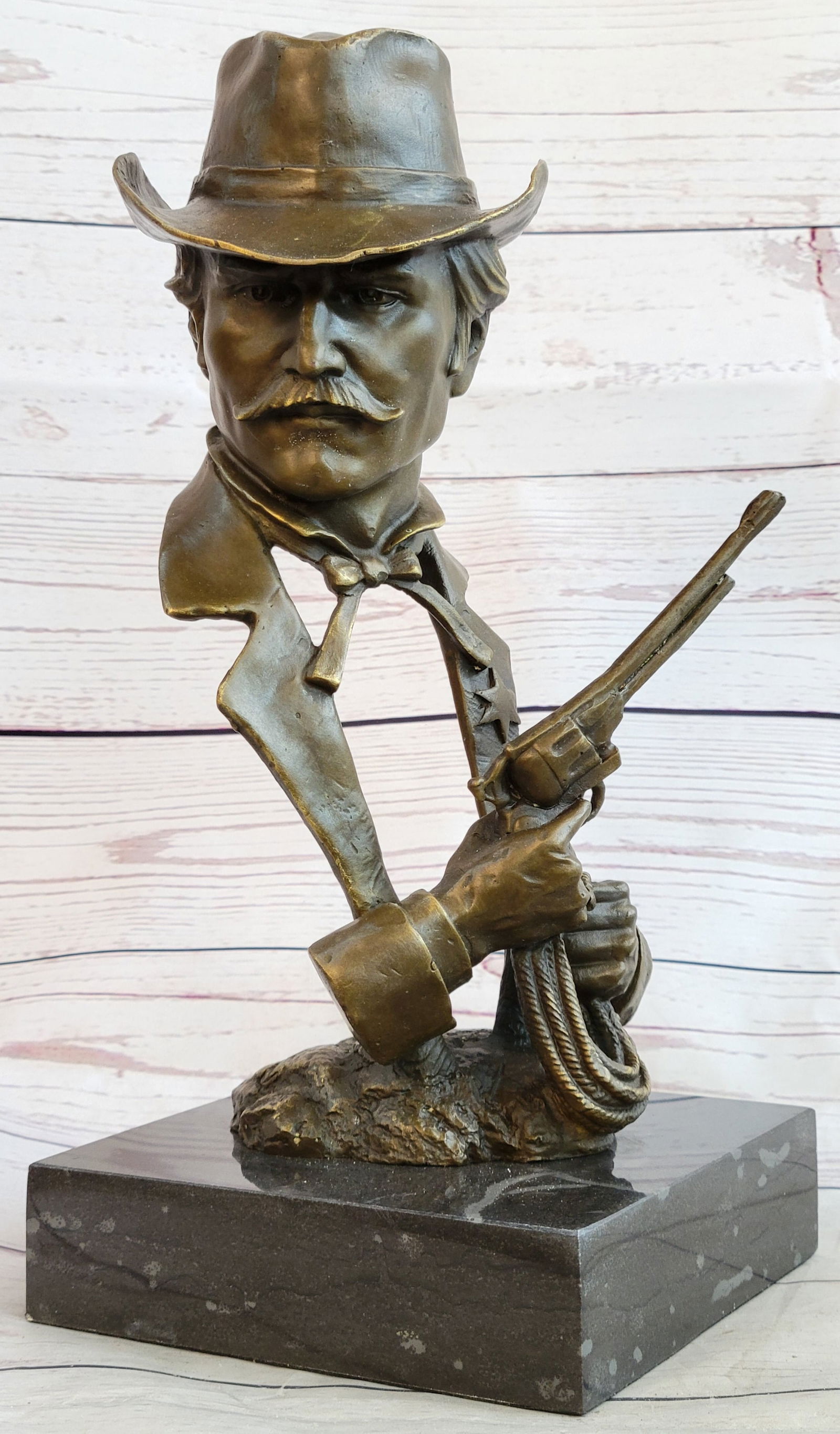 Gun Revolver Wyatt Earp Western Bronze Statue: Timothy Trask has skillfully crafted possibly the finest and most accurate representation of Wyatt Earp ever produced. Close attention to intricate detail brings Wyatt Earp back to life on that infamo