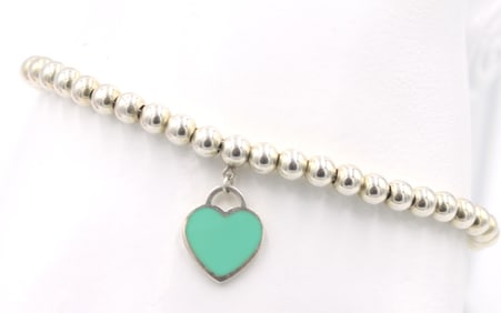 925 Sterling silver Tiffany & Co bracelet with blue heart shaped charm