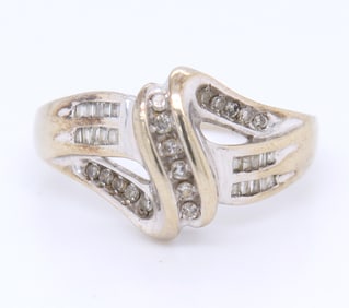 Handsome White Gold Round and Baguette Cut Diamond Ring