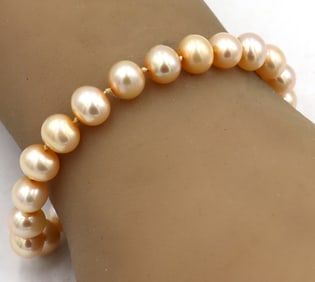 8mm Pearl bracelet with 14kt Yellow gold clasp